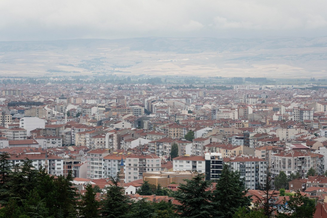Aerial view of Odunpazari Modern Museum with timber-latticed facade among low-rise buildings in Eskisehir, Turkey.