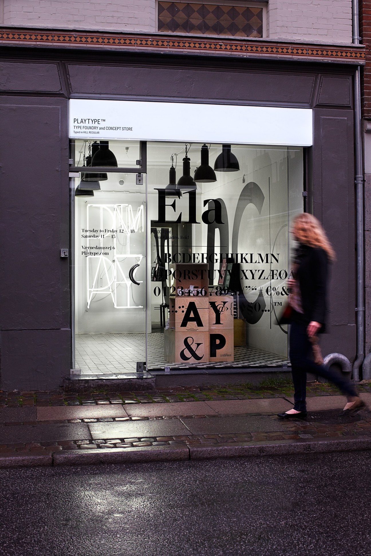 The Playtype storefront in Copenhagen displaying typography and font samples in its window.