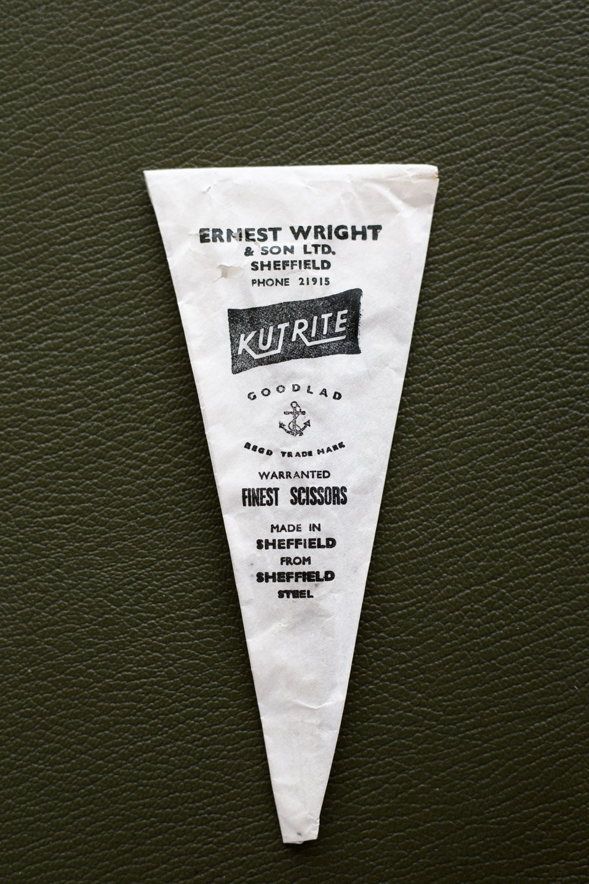 Vintage Ernest Wright & Son scissor packaging sleeve with Kutrite Goodlad branding on green background.
