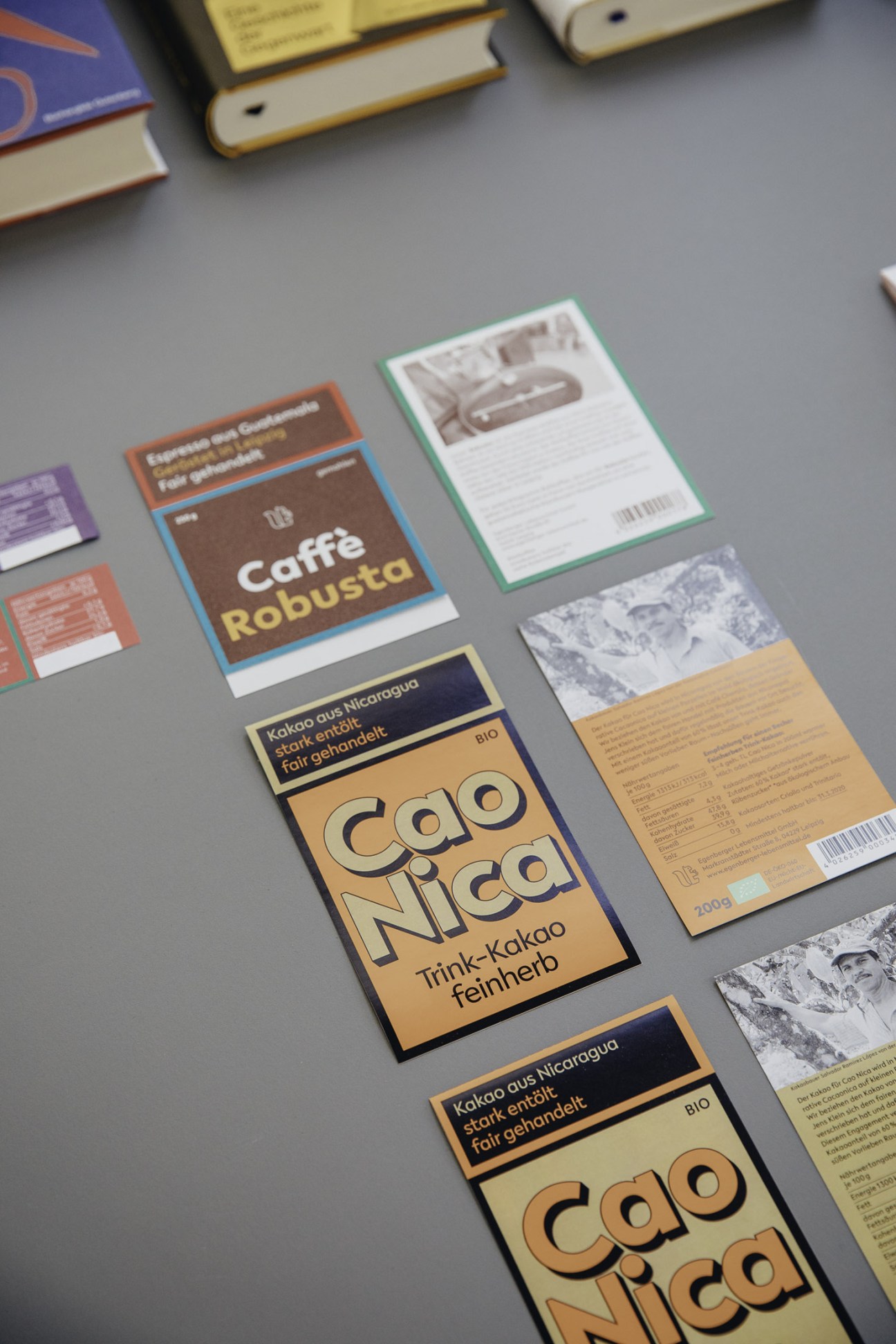 Packaging designed by Hug & Eberlein displayed on a gray surface.