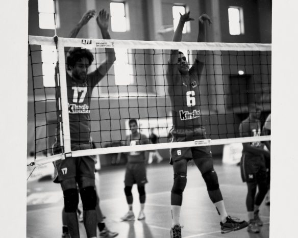 Portuguese volleyball players in action during a match at the Jogos da Lusofonia games.