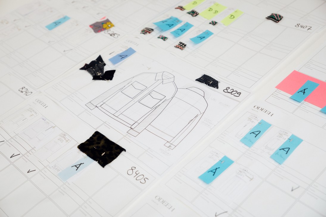 Design sketches and fabric swatches organized on a layout grid with color samples and garment drawings.