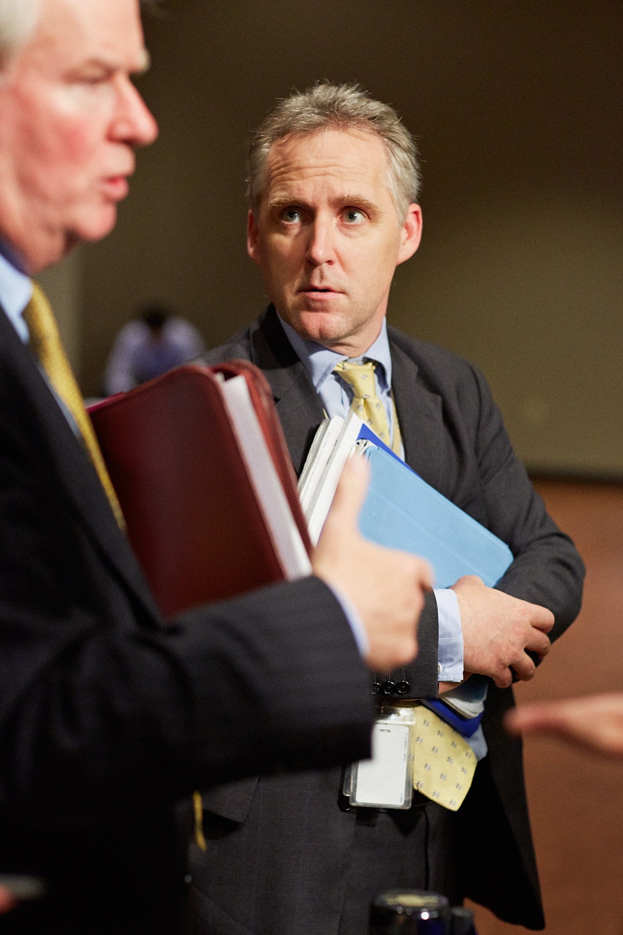 Michael Tatham, UK political co-ordinator, holding documents at the UN Security Council.