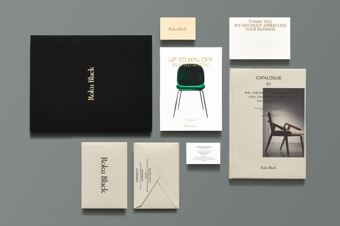 Print materials for Roku Black brand including black box, cream cards, and catalogue with minimalist design and typography.