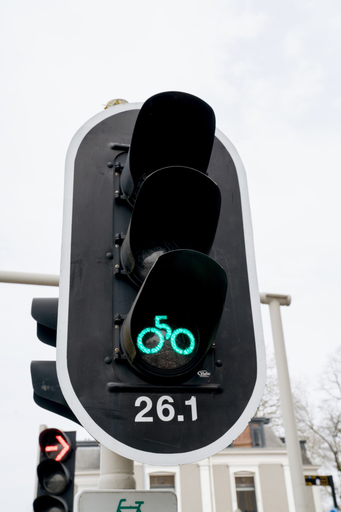 Traffic light showing a green bicycle symbol with the number 26.1 displayed below.