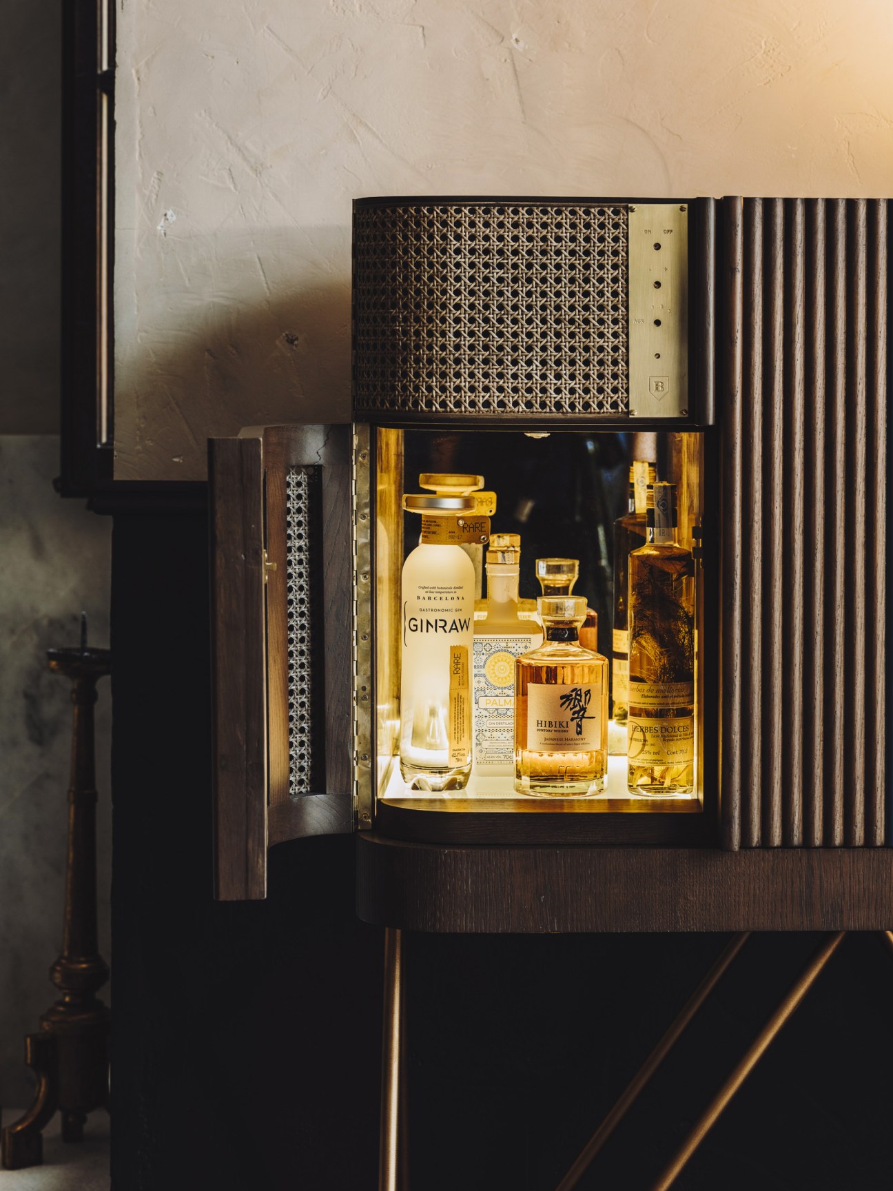 Custom cocktail cabinet with built-in radio designed by Ohlab architecture studio