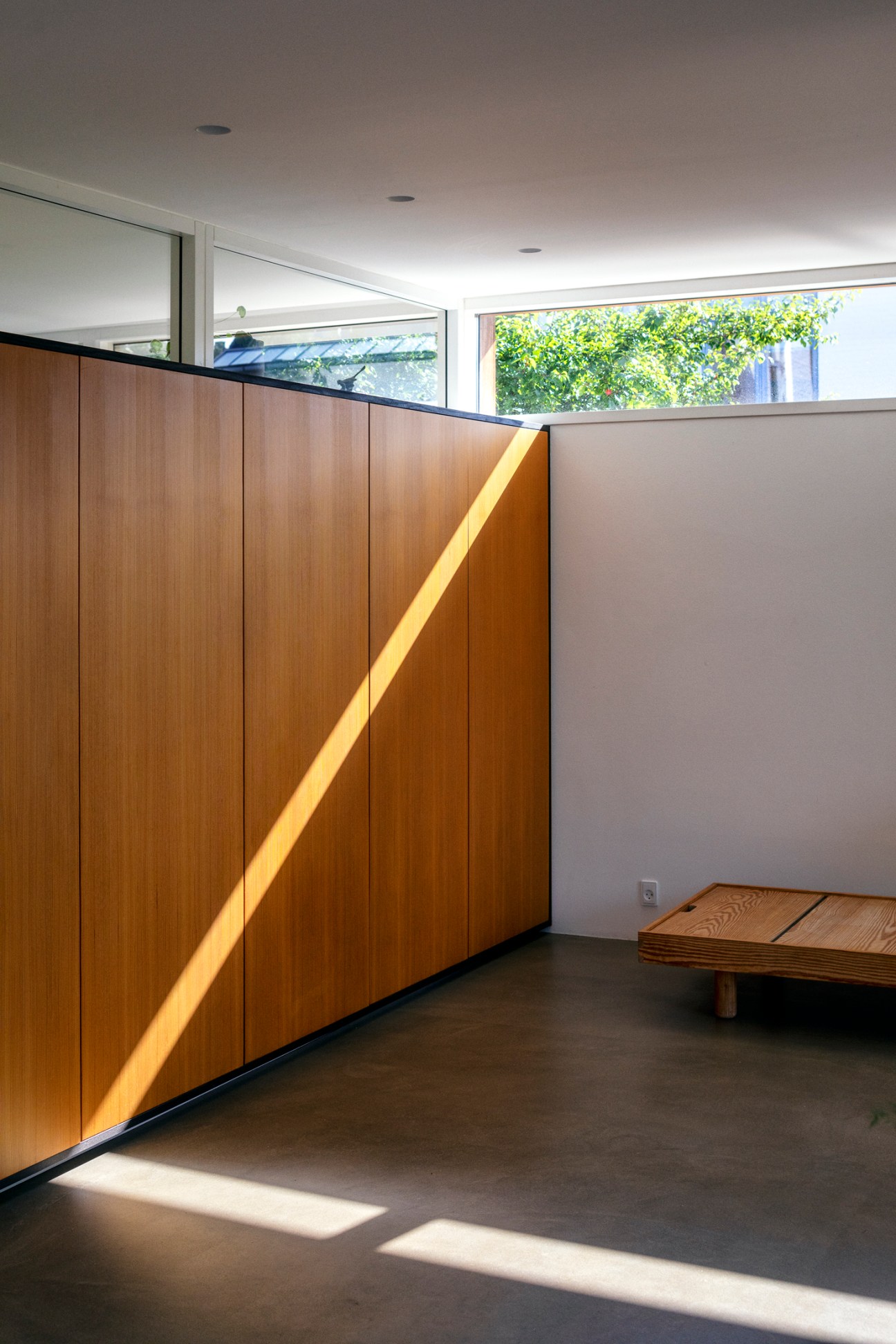 Interior window detail showing carefully positioned openings designed to maximize natural light