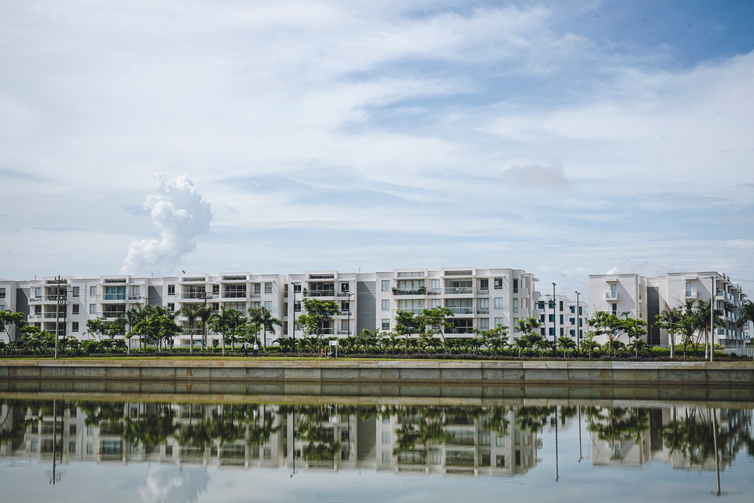 Mid-range apartments on Serena del Mar's central waterway with perfect reflections in still water