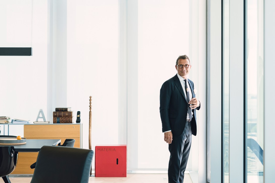 António Mexia, EDP chief executive, standing in his seventh-floor office with floor-to-ceiling windows overlooking the River Tagus.