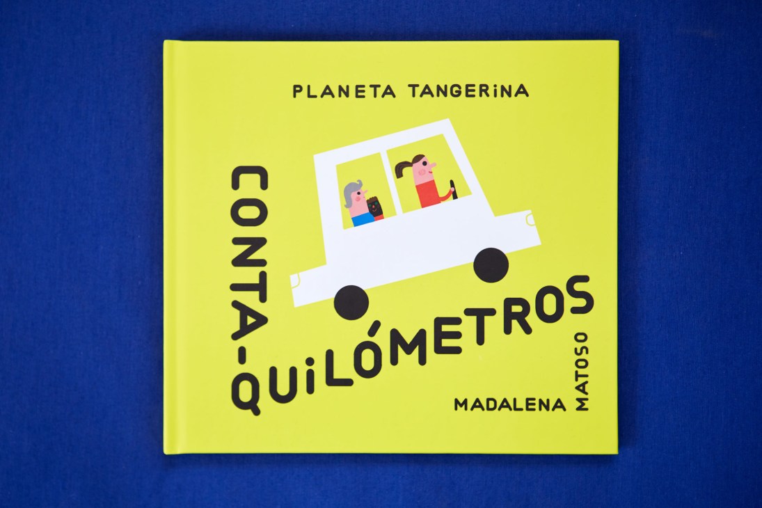 Planeta Tangerina children's book 'Conta-Quilómetros' with bright yellow cover and illustrated vehicle design by Madalena Matoso.