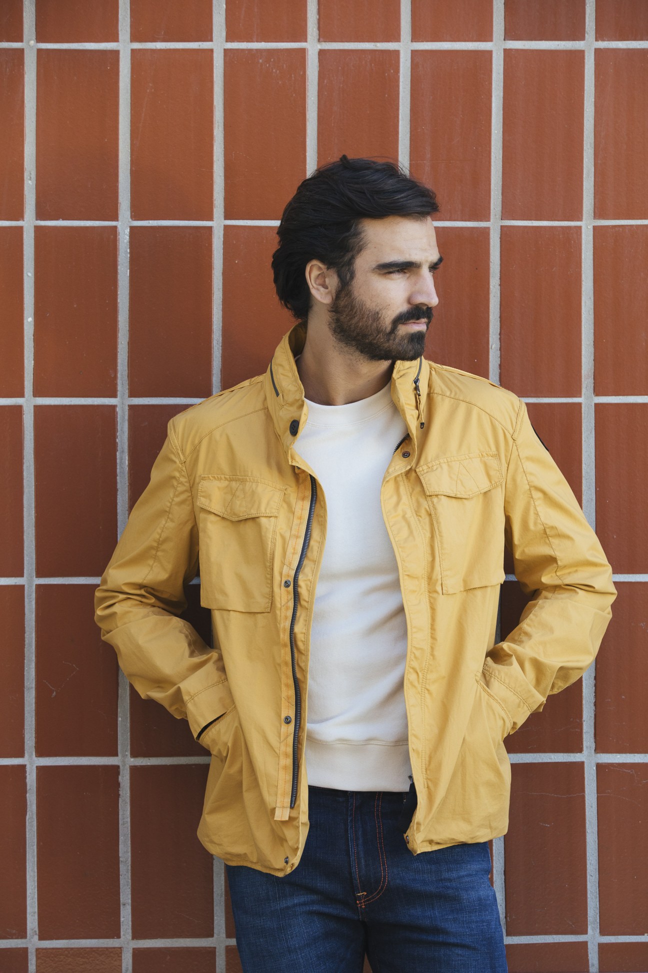 Model in Parajumpers jacket with La Paz sweatshirt and Roy Roger's jeans