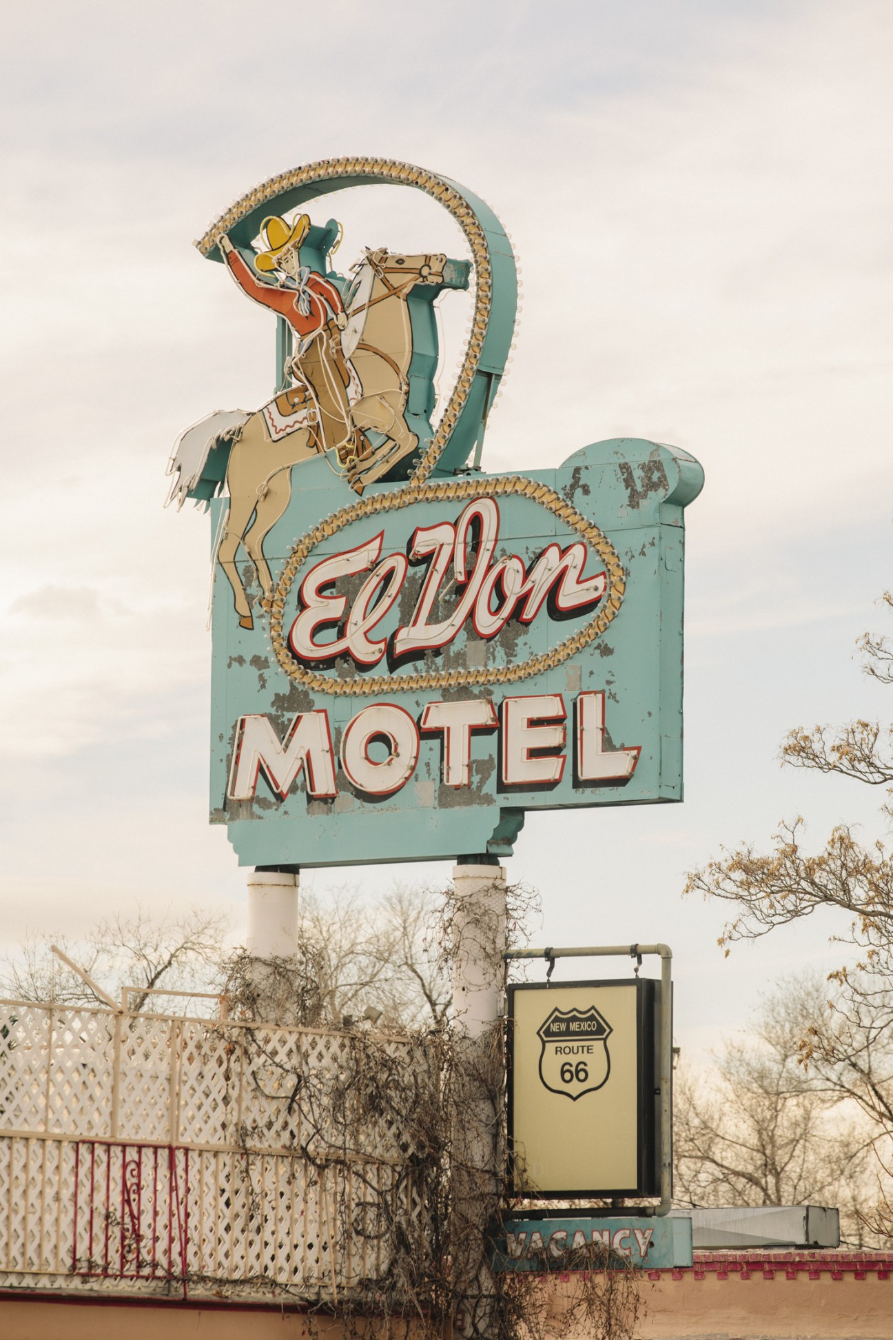 Vintage El Don Motel neon sign on Route 66 in Albuquerque with cowboy and horse design