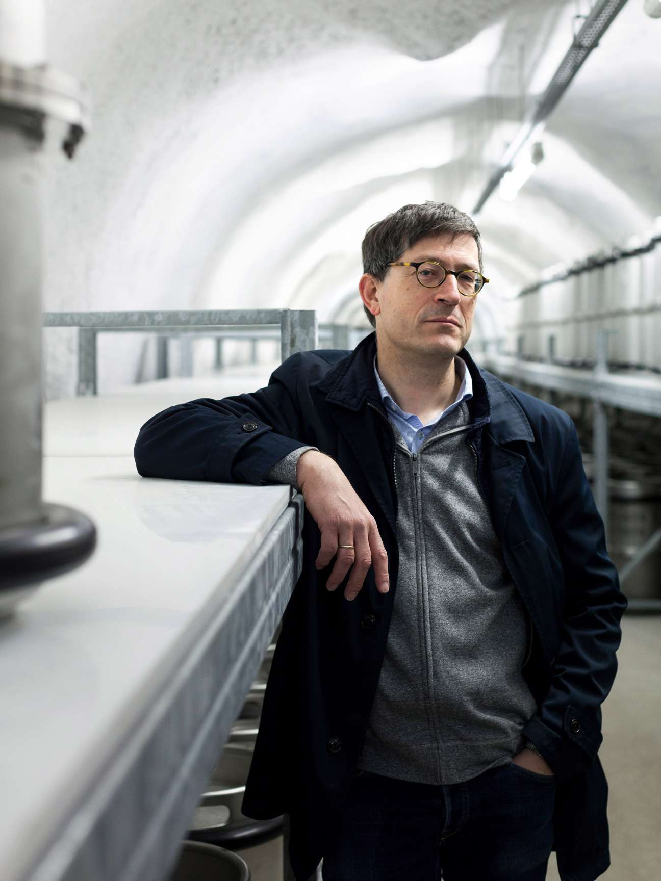 Martin Luchterhand, state archivist of Berlin, stands in the underground tunnel of Barbarastollen archive.