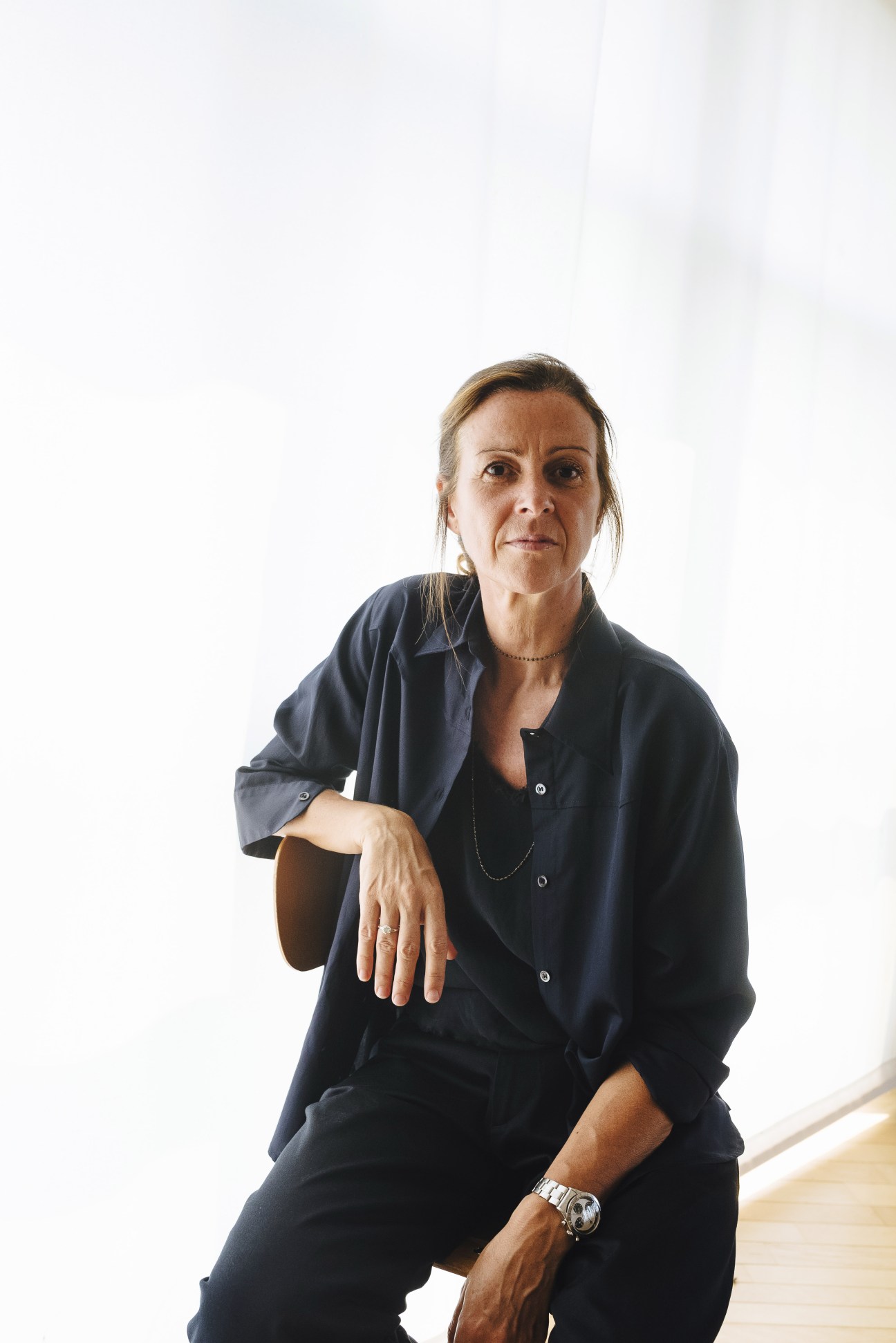 Francesca Zara, head of womenswear at Barena, wearing navy clothing against a white background.