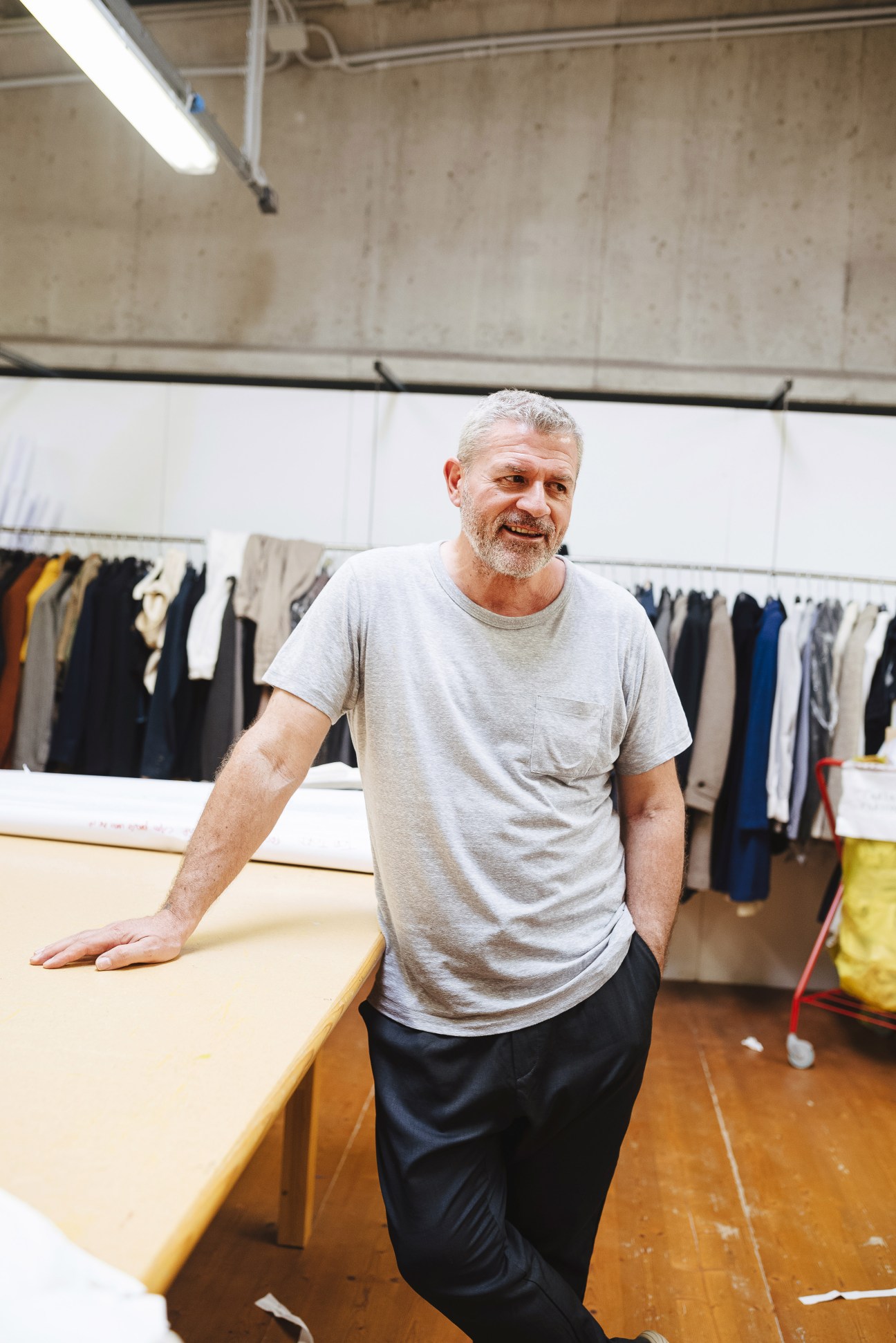 Massimo Pigozzo, head of menswear at Barena, stands in the studio wearing a grey t-shirt.