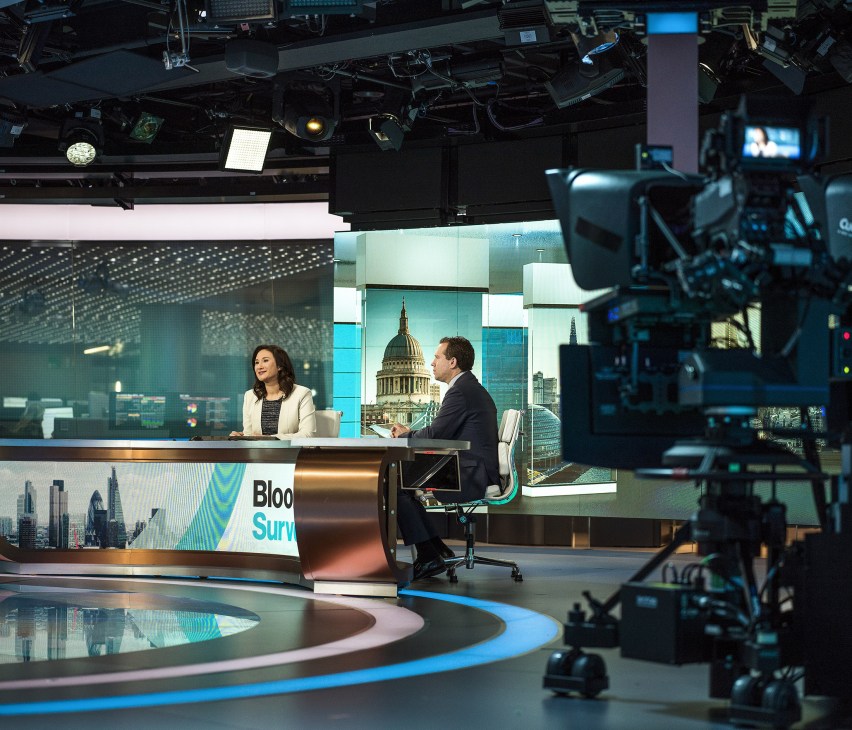 Bloomberg television studio with cameras, lighting setup and modern broadcasting equipment.