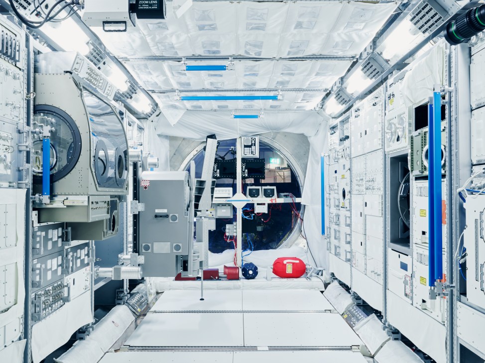 Interior view of ESA module mock-up on the International Space Station with equipment and systems.