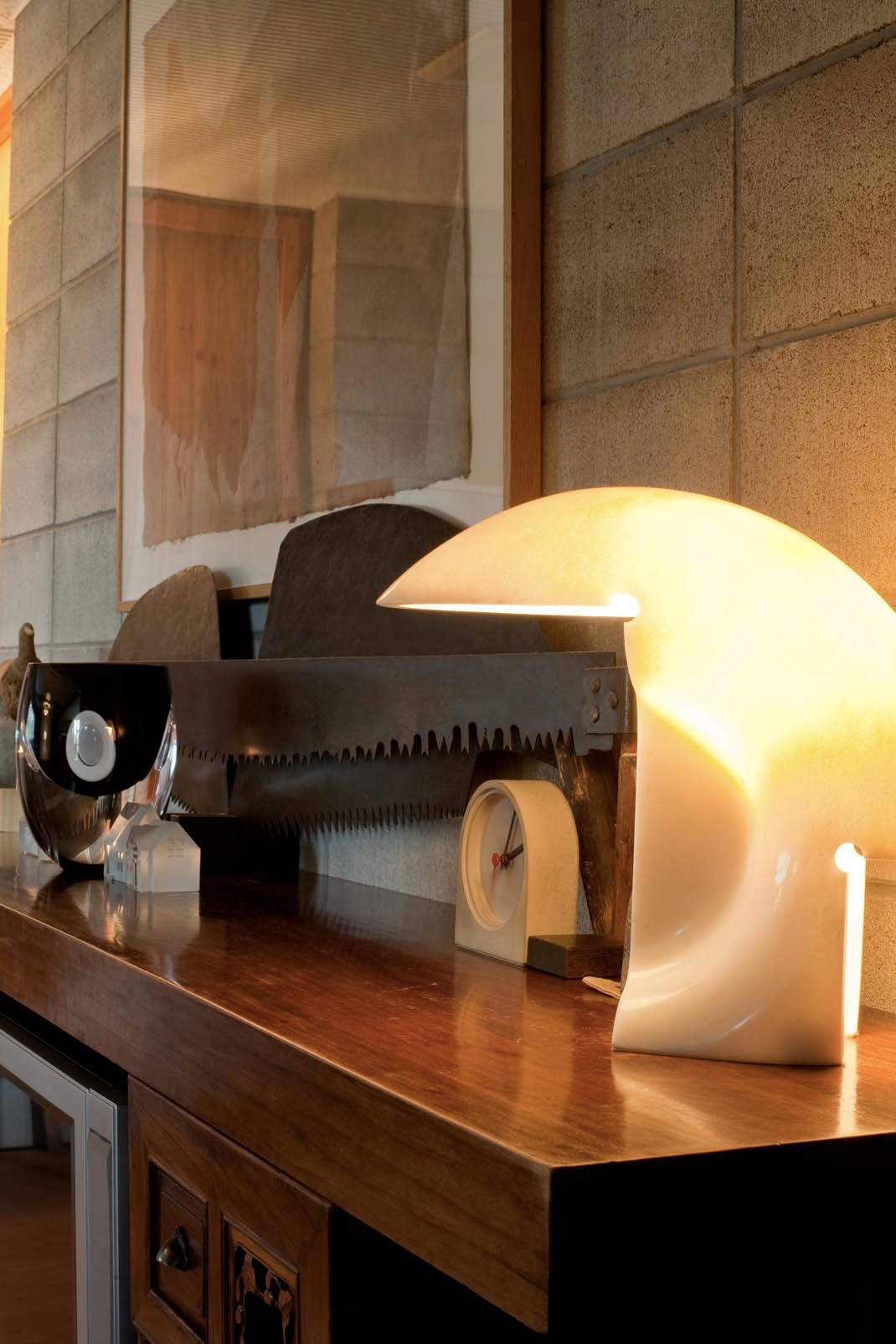 Marble light by Afra & Tobia Scarpa for Flos on wooden surface with design objects.