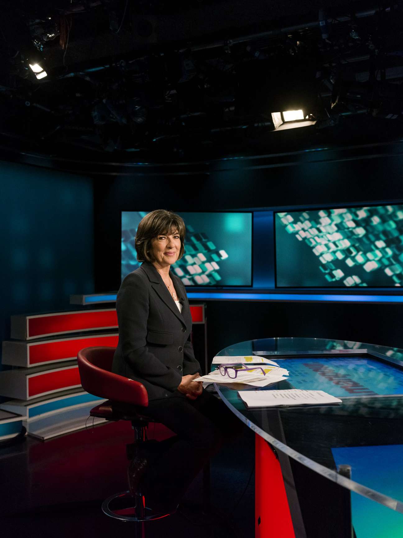 Christiane Amanpour seated in a television studio wearing a dark blazer