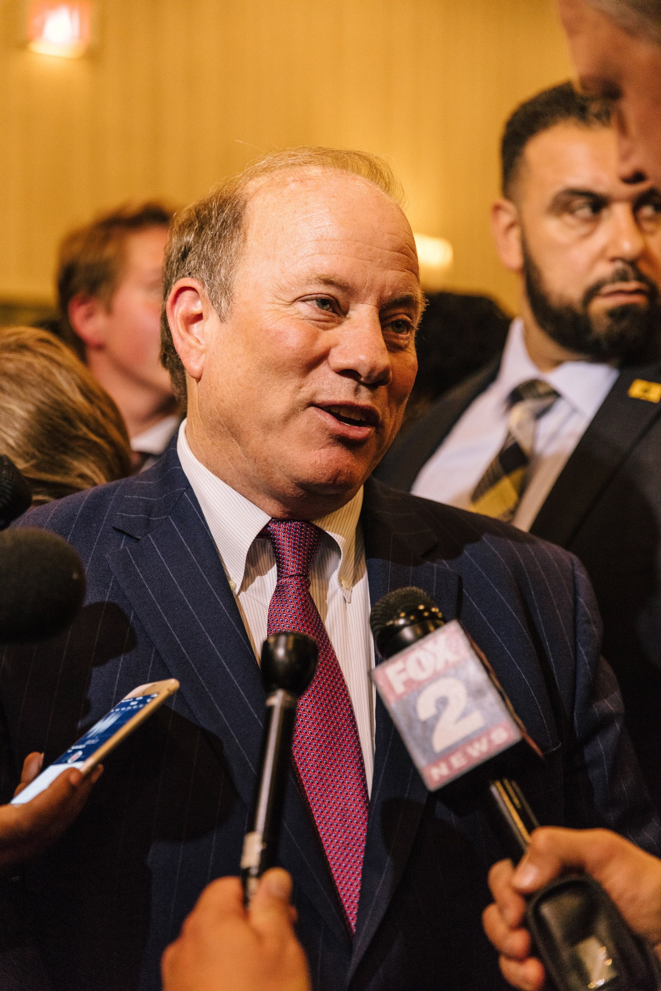 Detroit Mayor Mike Duggan speaking to media at a mayoral primary election event.
