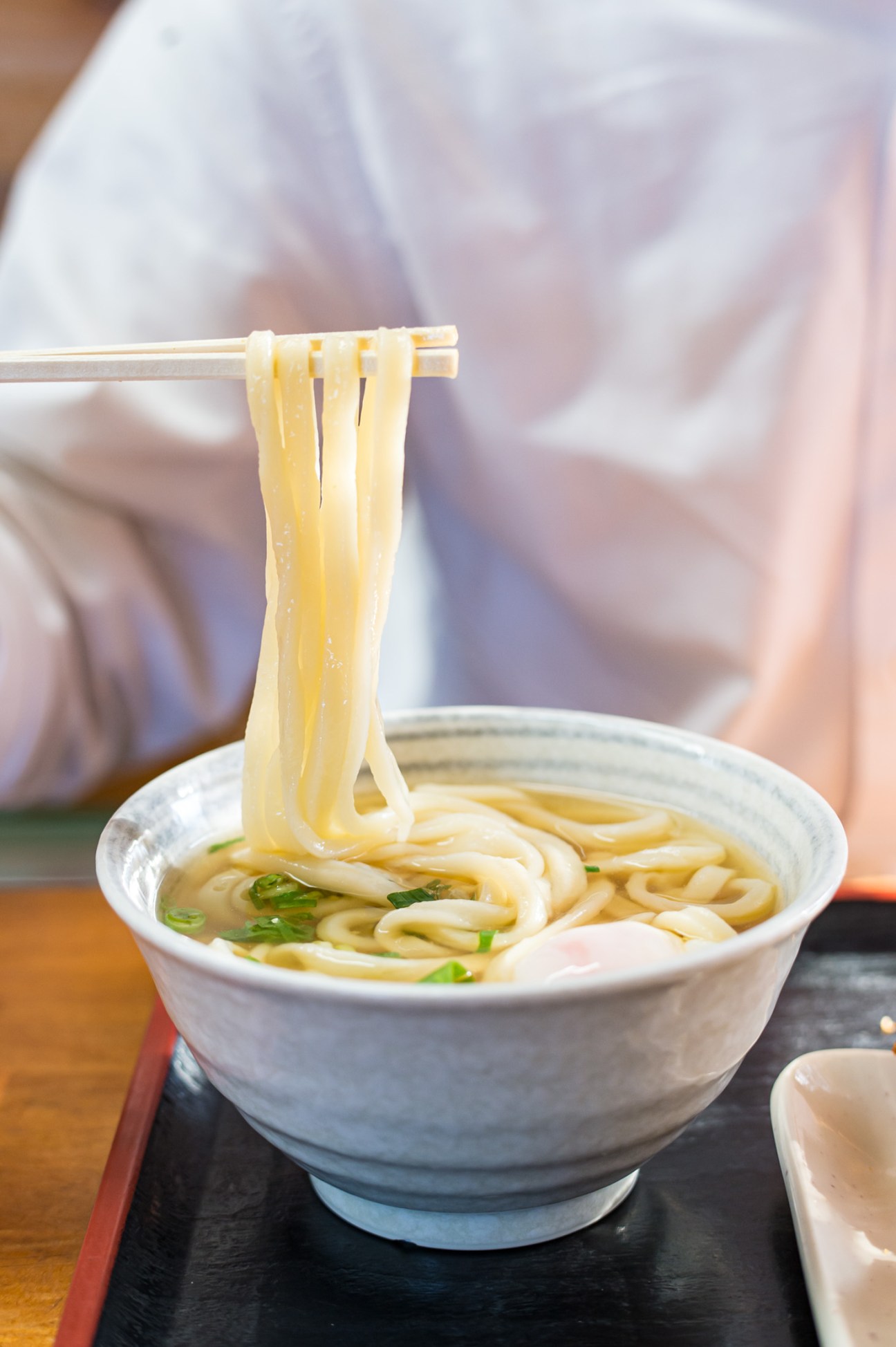 Interior of a Kagawa udon shop showing high quality preparation and service