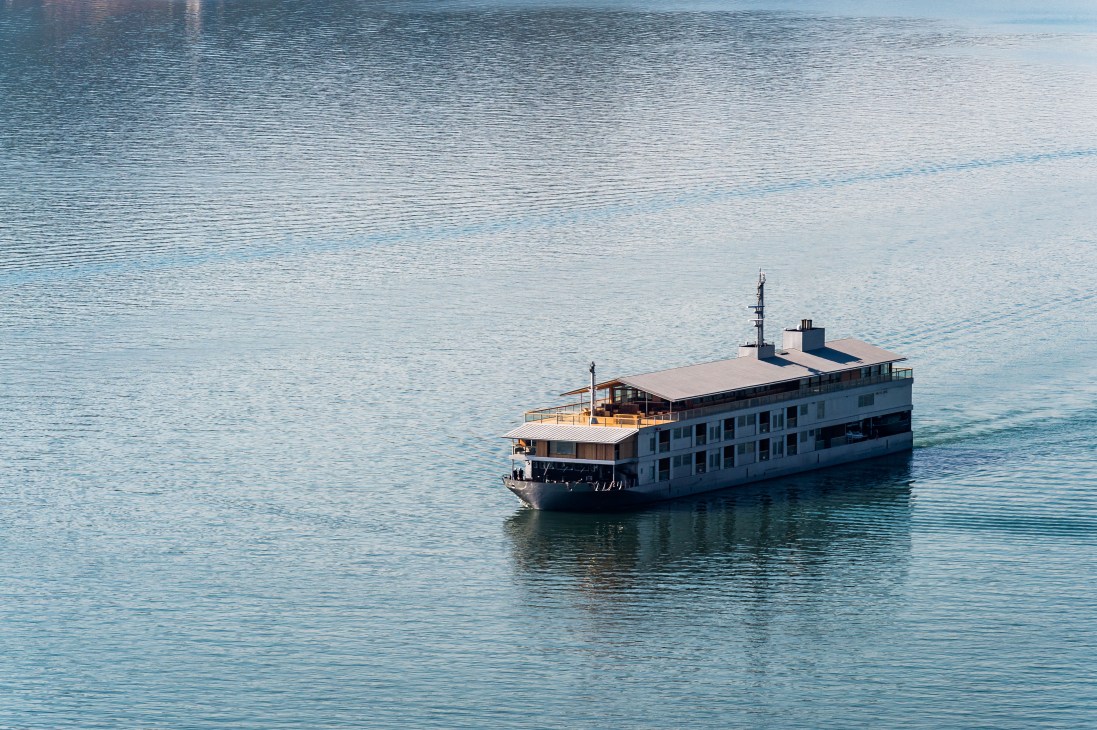 Guntu floating hotel cruises on calm blue waters of Japan's Seto Inland Sea.