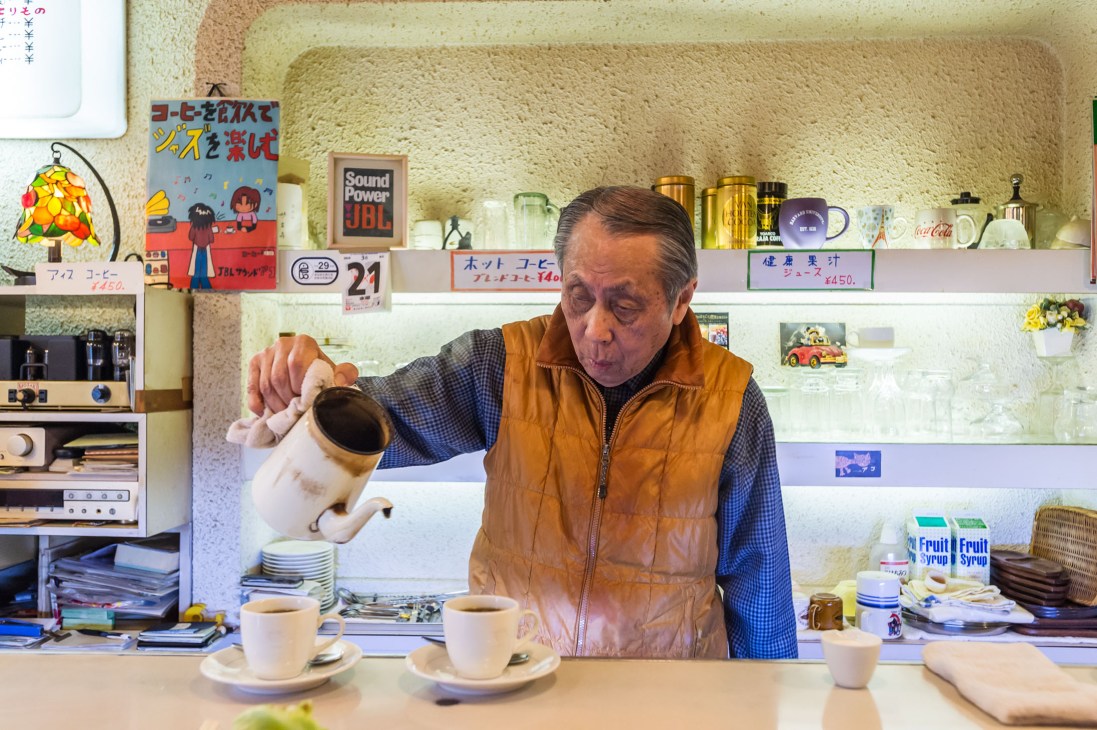 Nobuo Okano pours coffee at Parlour Ako, a jazz kissaten he has run for 50 years.