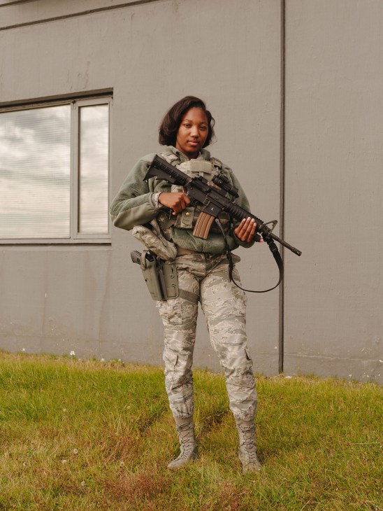 US military personnel in camouflage uniform holding an assault rifle at Keflavík air base in Iceland.