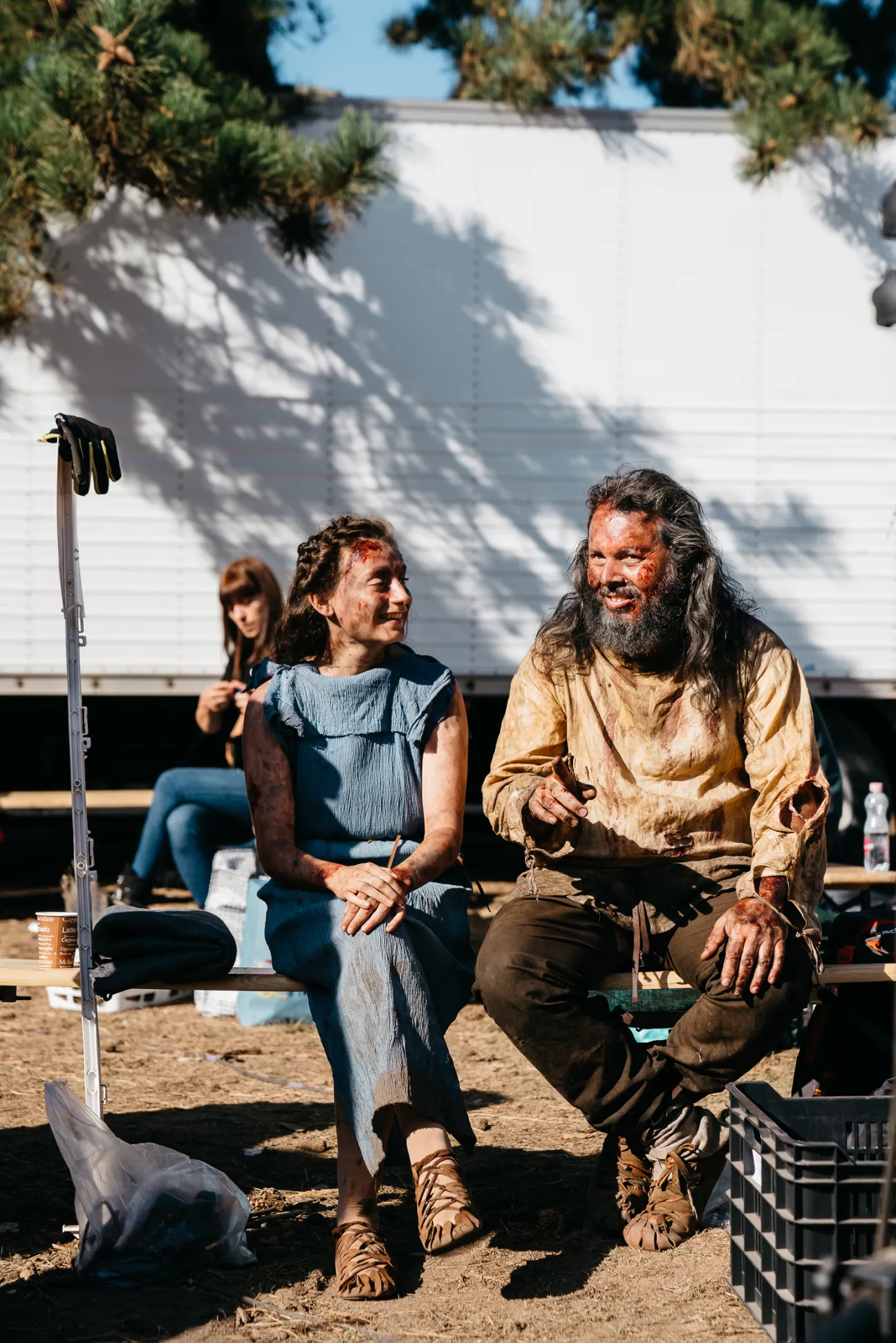 Actors in period costume take a break on set during filming of The Barbarians.