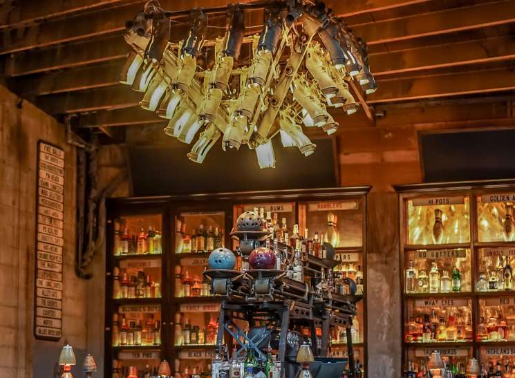 Elegant chandelier hanging over seating area at Highland Park Bowl