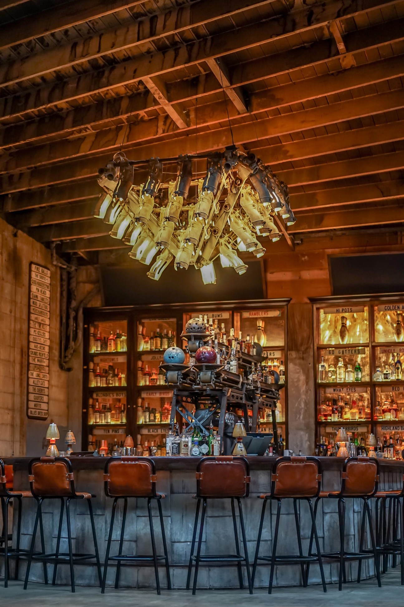 Elegant chandelier hanging over seating area at Highland Park Bowl