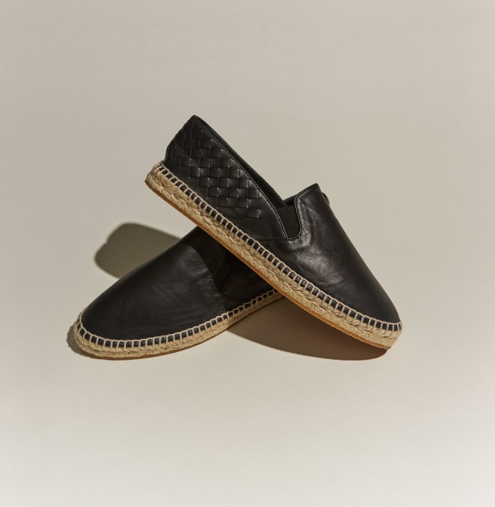 Black leather espadrilles with woven jute sole by Bottega Veneta.