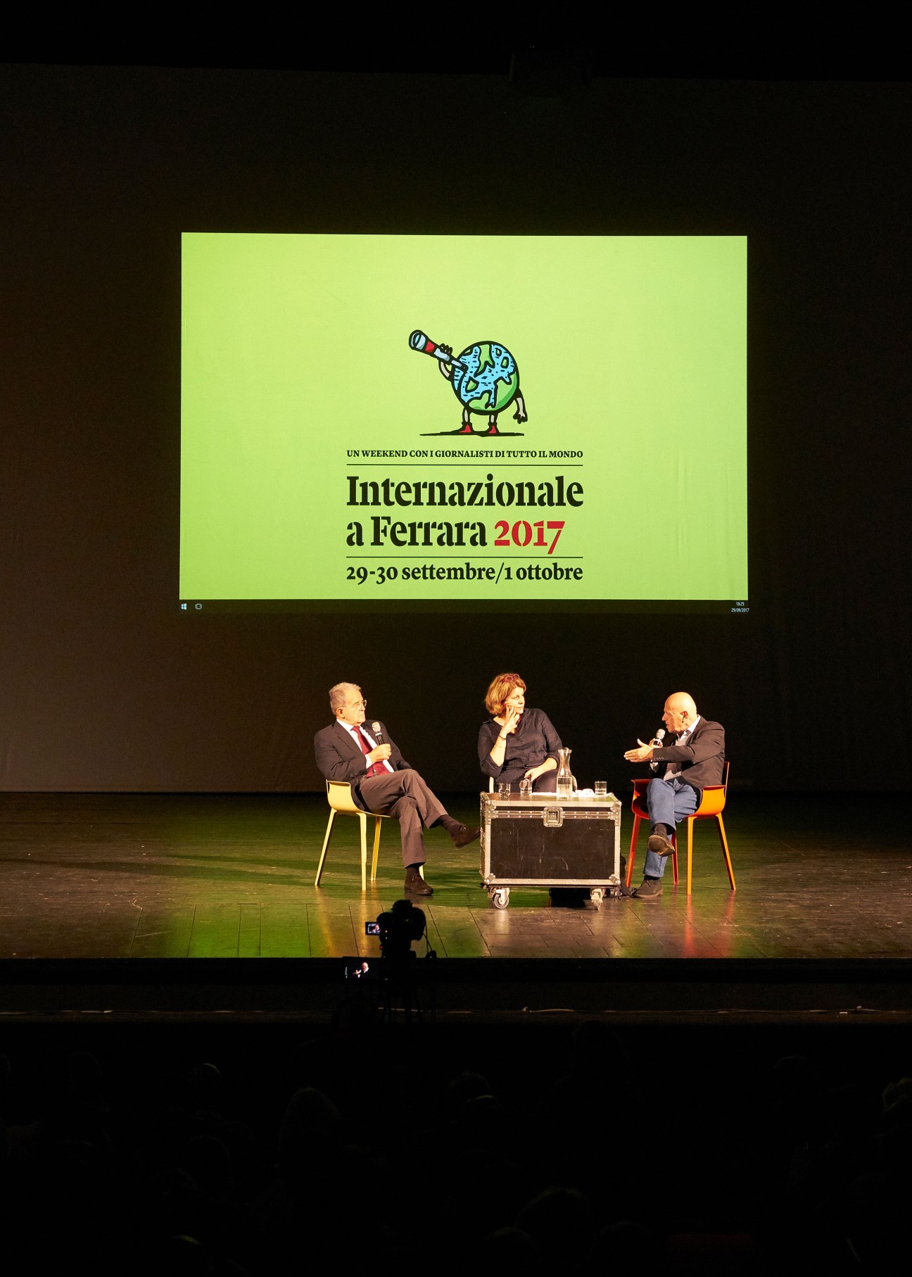 Romano Prodi and two other speakers on stage at Teatro Nuovo during Internazionale a Ferrara festival 2017