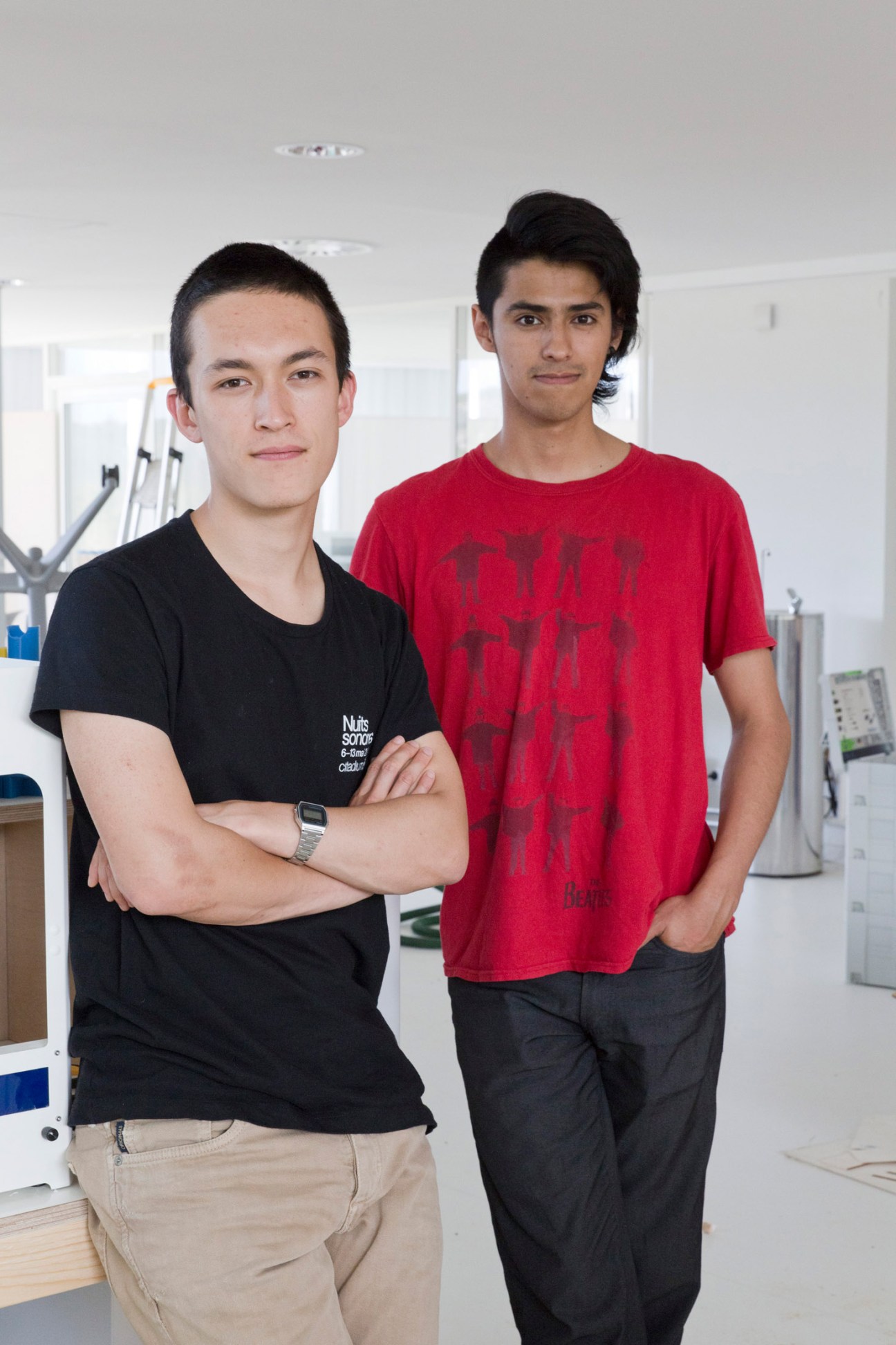 Stéphane Garti and Daniel Amaya, Wearkit collaborators, posing in a bright workspace.