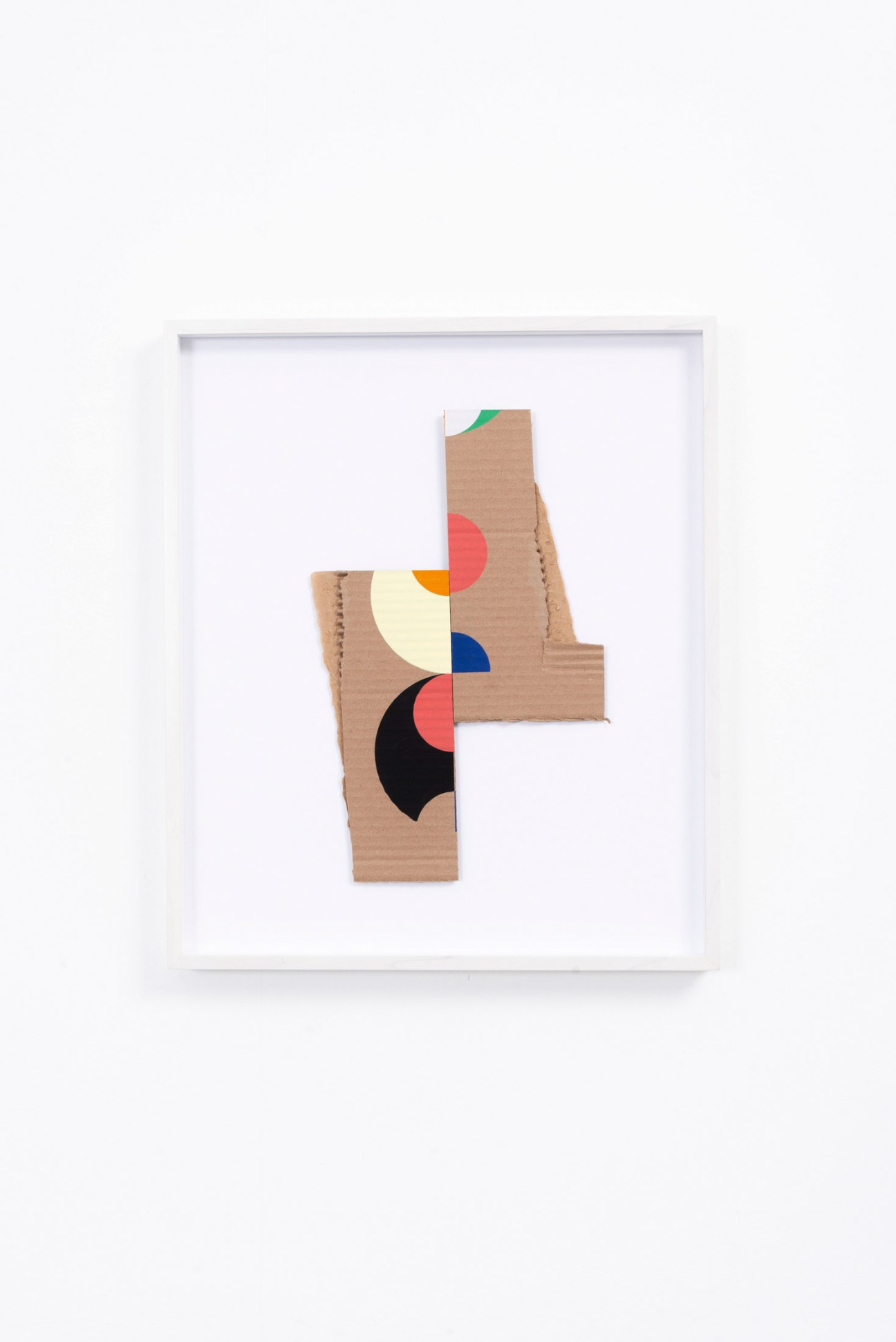 Jose Davila's abstract cardboard sculpture 'Orden Discontinuo XX' featuring geometric shapes in red, yellow, blue, green and black.