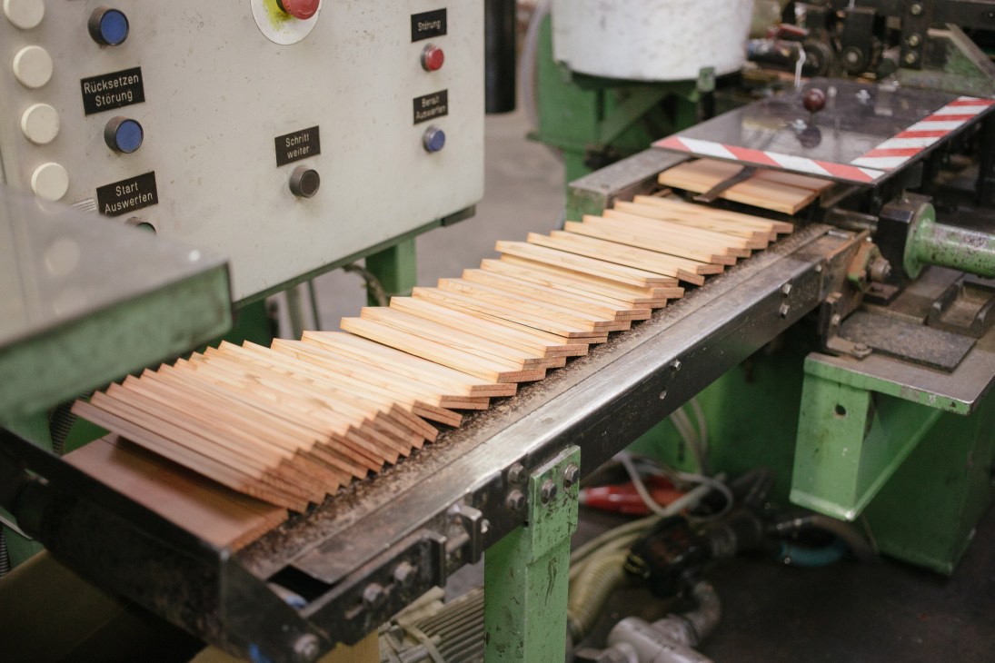 Wood slats arranged on a conveyor belt inside Lyra's pencil factory in Nuremberg.