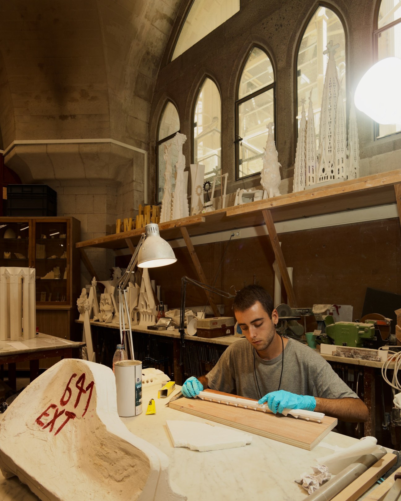 Technician works on reconstructing Gaudí's original plans in the Sagrada Família's 3D workshop.