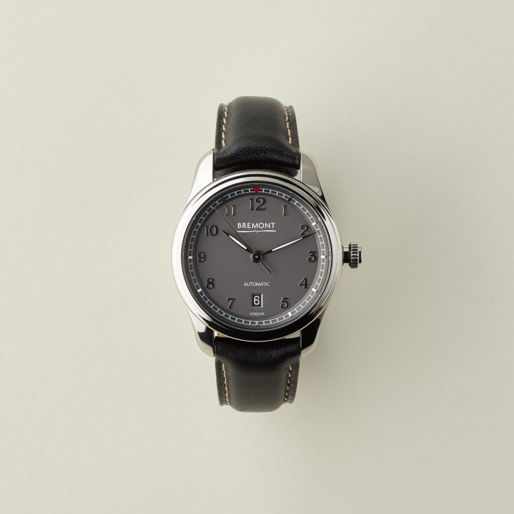 Bremont Airco Mach 2 watch with silver case, dark dial, and black leather strap.