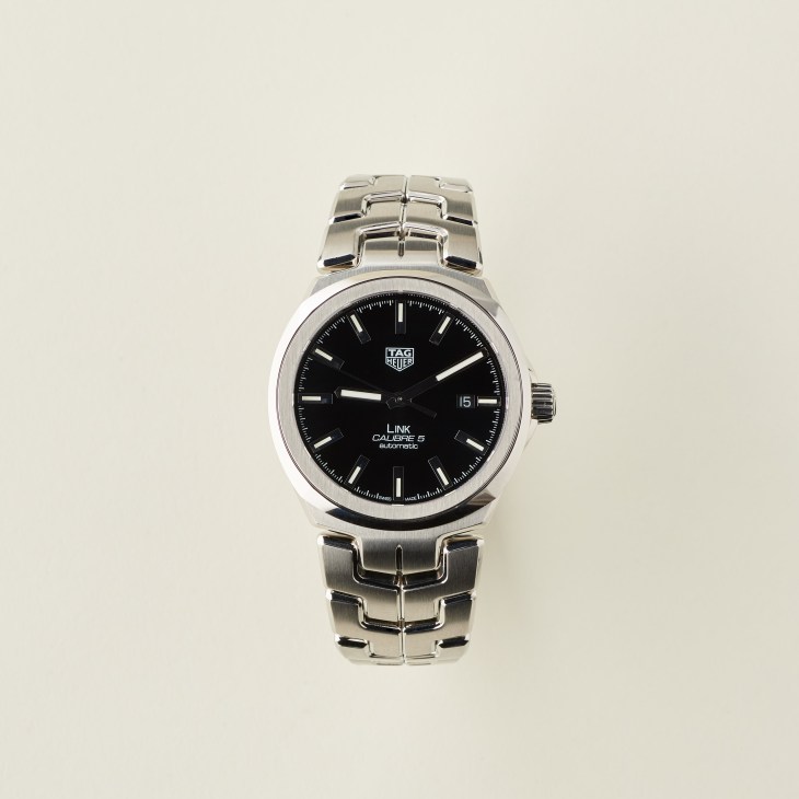 Tag Heuer Link Calibre 5 watch with black dial and stainless steel bracelet