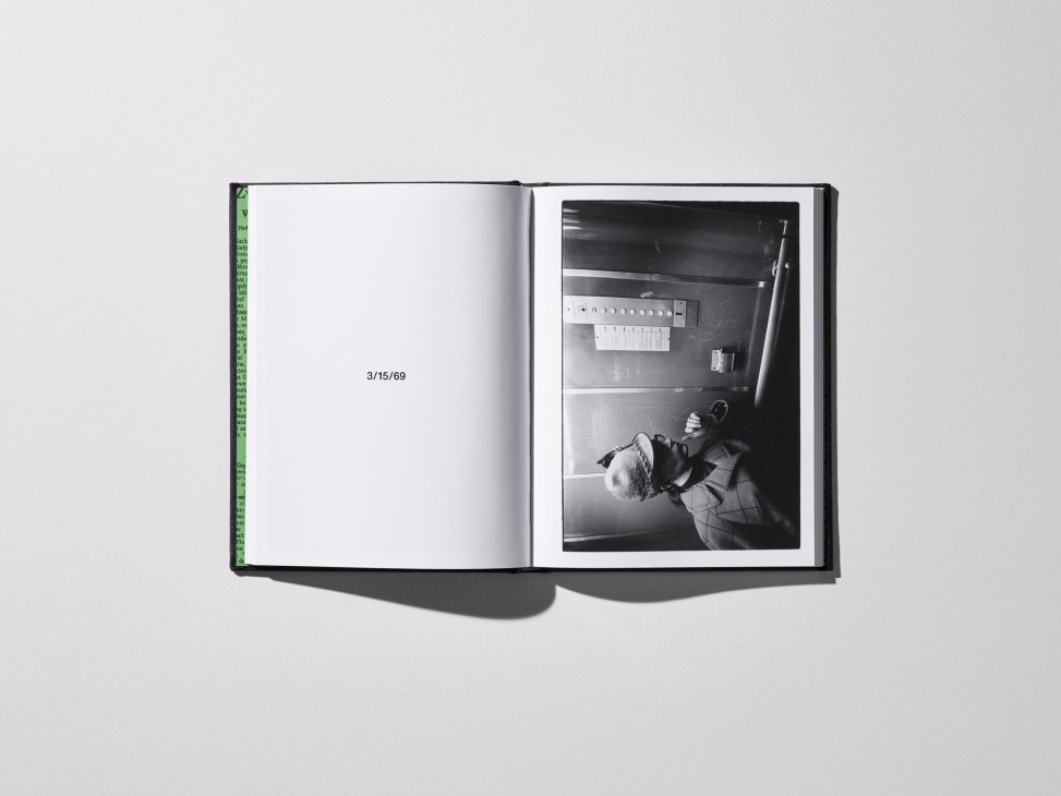 Open book spread showing a black and white photograph of a person in an elevator dated 3/15/69.