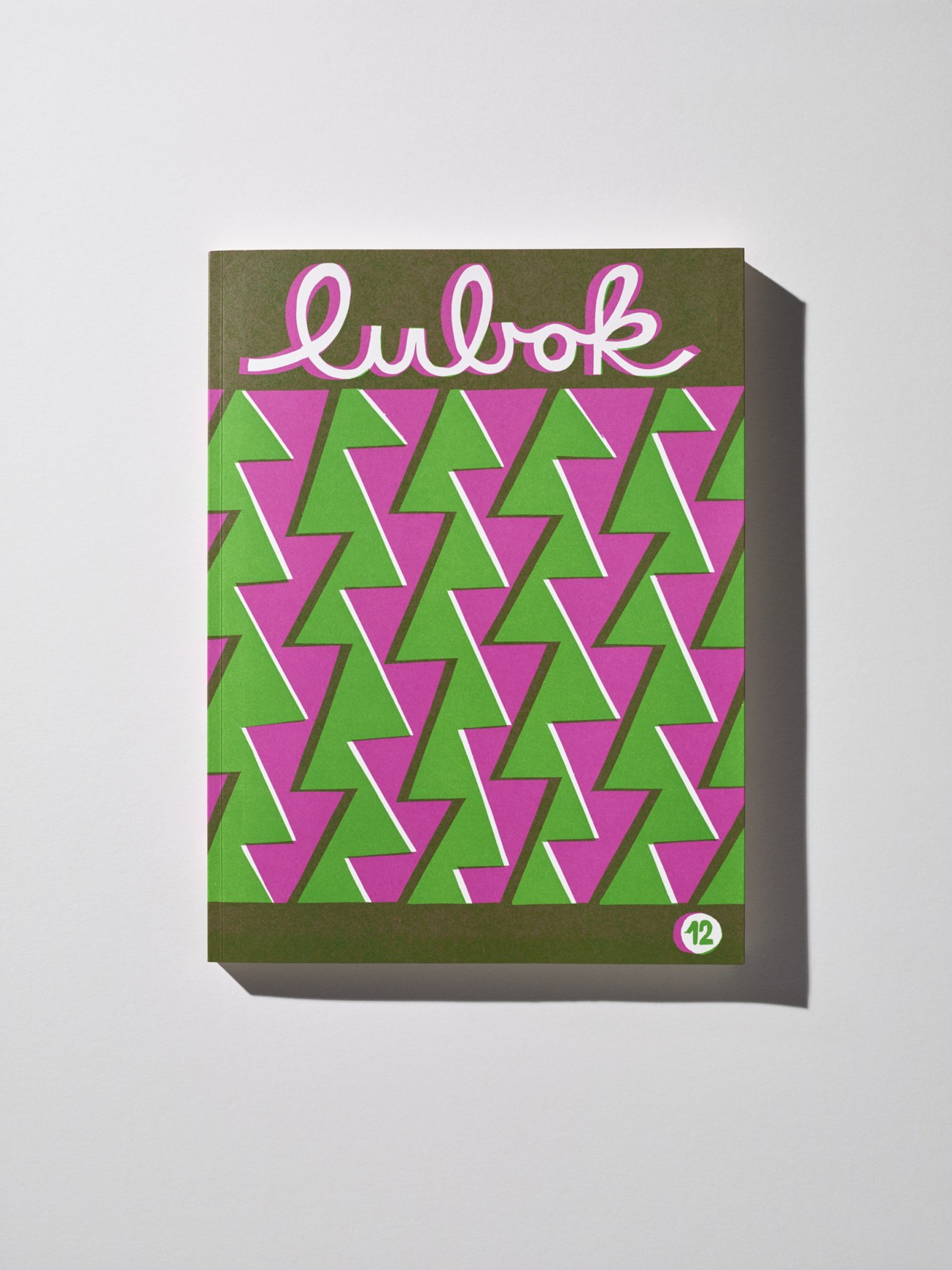 Lubok magazine issue 12 with pink and green geometric triangle pattern cover design.