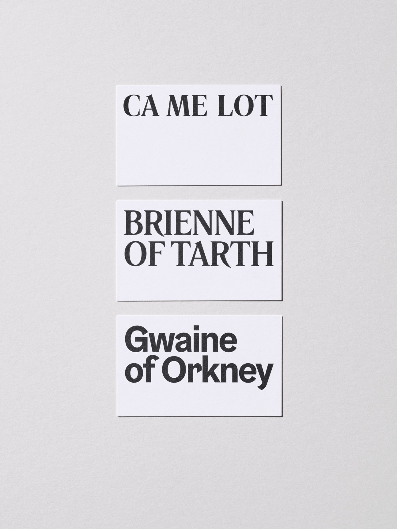 Three white cards displaying typography samples from Camelot typefaces in black serif fonts.