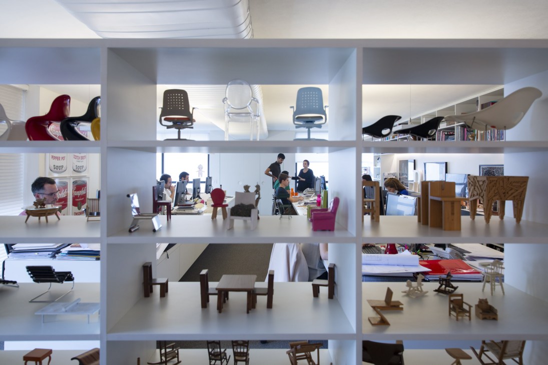 Display of decorative objects and collectibles in Marcio Kogan's office space