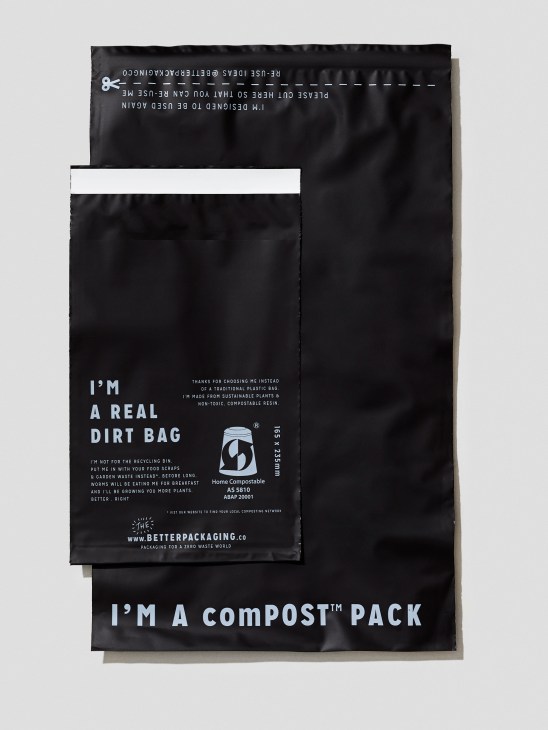 Two black compostable jiffy bags with white text and messaging about sustainable packaging.