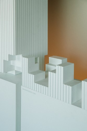 White architectural model of the Westlink Tower in Zürich showing a tall building structure
