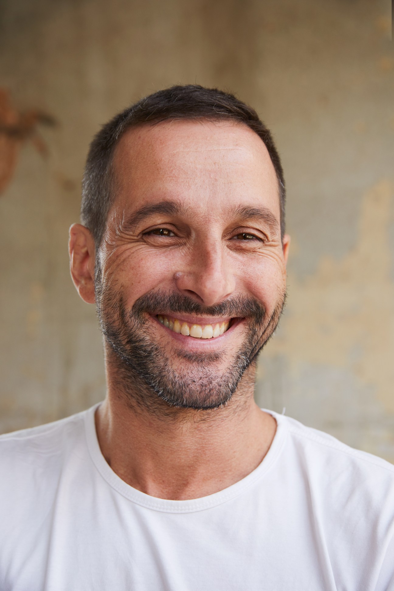 Portrait of Jeremy Chabaud standing in a gallery space