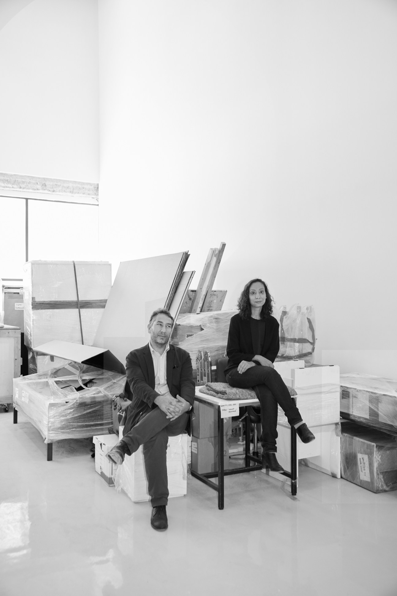 Portrait of two people, Jocelyn Wolff and Sandrine Djerouet, standing together in a gallery space