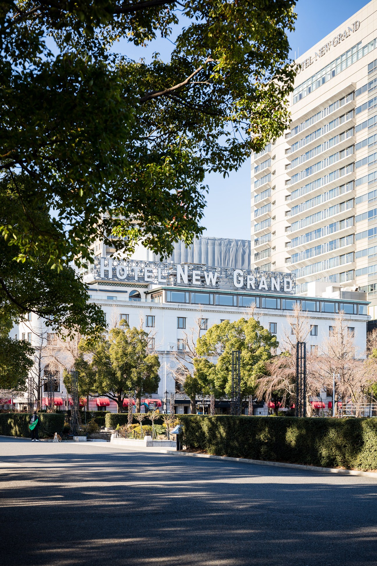 Hotel New Grand's iconic signage and facade viewed from Yamashita Park in Yokohama.