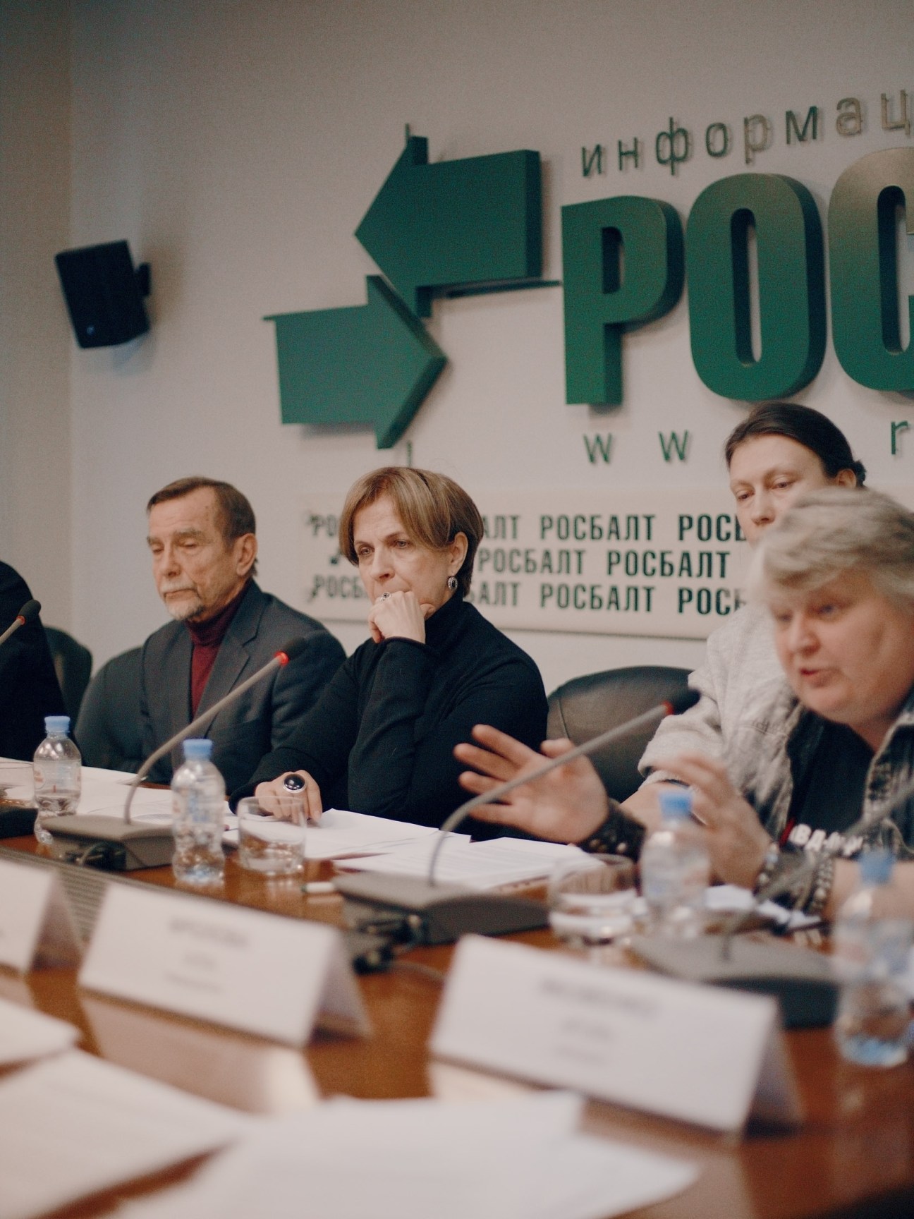 Activists Lev Ponomarev and Zoya Svetova seated at a table during an Open Russia press conference.