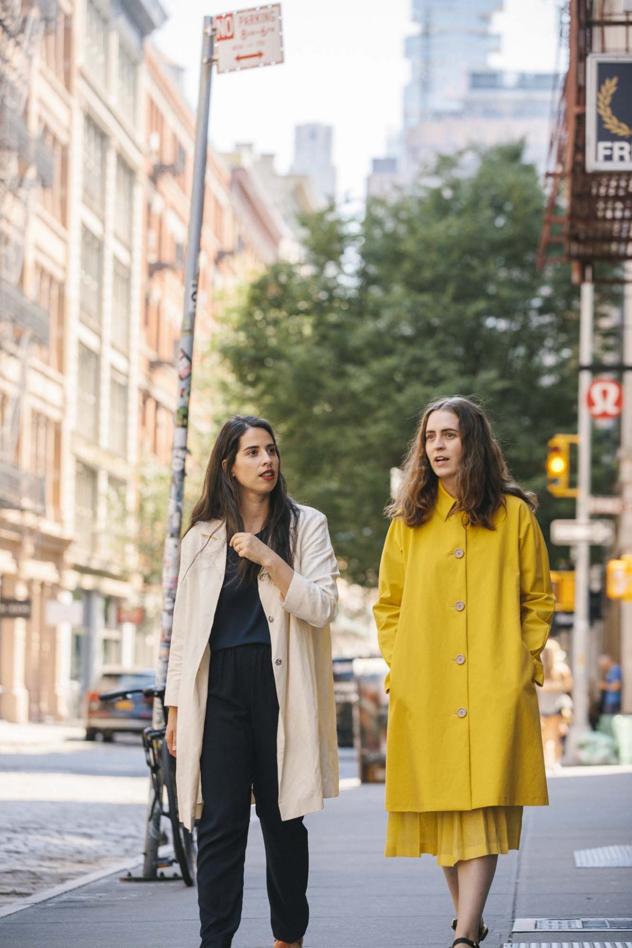 Mansur Gavriel co-founders Floriana Gavriel and Rachel Mansur walking on a New York City street.